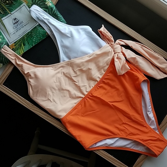 orange and white one piece swimsuit